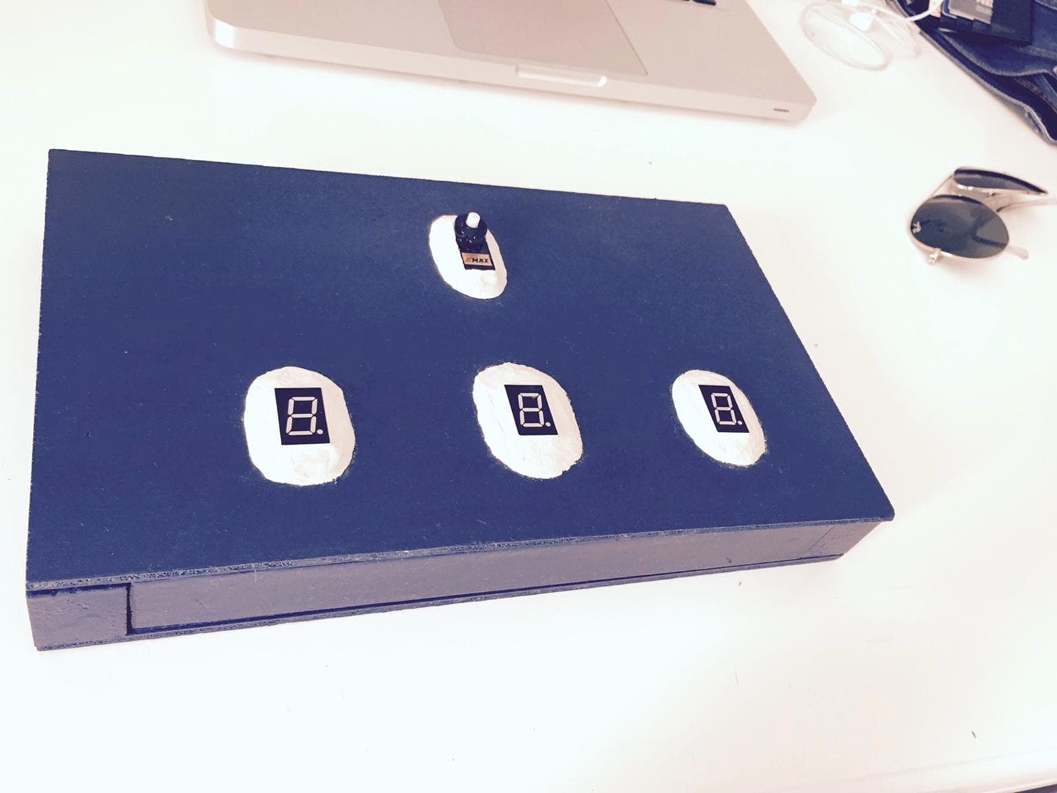 Facebook Box: blue box with three 7-segment displays and a servo on the lid
